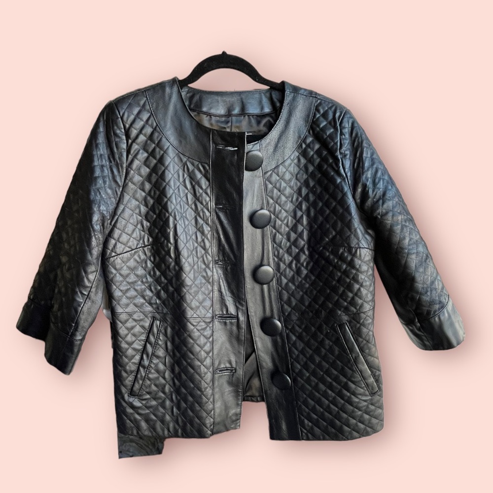 Used black leather jacket